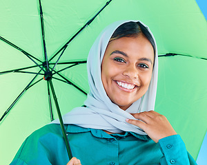 Image showing Fashion portrait, Muslim and happy woman with umbrella, designer brand clothes or casual outfit style. Trendy gen z winter aesthetic, beauty smile and face of Arabic Islamic female in studio