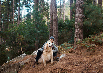 Image showing Senior woman, hiking with dog in forest and adventure, fitness with travel and pet with love and care. Nature, trekking and vitality with mature female and puppy outdoor with wellness and retirement