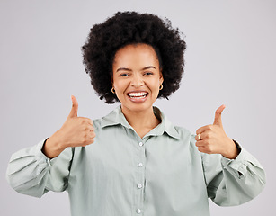 Image showing Portrait, thumbs up and black woman laughing in studio isolated on a white background. Success, happiness and person with hand gesture or emoji for winning, approval or agreement, like or thank you.