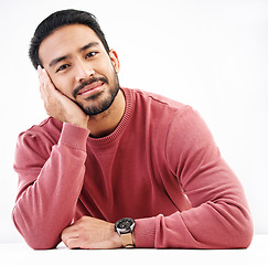 Image showing Relax, man and portrait in a studio with a smile looking attractive and handsome. Isolated, white background and resting male model feeling calm, friendly and confident with modern style smiling