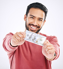 Image showing Money, cash and portrait of man with dollar on white background for investment, financial savings and payment. Finance profit, winner and isolated male for winning, stock market and success in studio