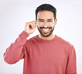 Image showing Glasses, happy man and portrait in a studio with a smile from vision and eyewear choice. Isolated, white background and happiness of a excited male model with lens prescription and frame decision