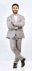 Image showing Portrait, professional and a business man on a gray background, standing arms crossed in studio. Corporate, smile and trust with a happy male employee looking confident in the success of his company