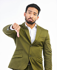 Image showing Thumbs down, sad man and portrait in a studio with bad feedback, voting and emoji hand sign. Negative opinion, decision and wrong hands gesture of a upset business man with isolated white background