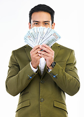 Image showing Money, cash and portrait of business man on studio background for investment, bonus and stock market. Finance success, winner and isolated male with bills for winning, profit and wealth opportunity