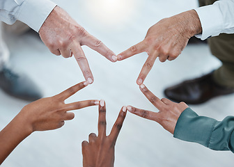 Image showing Teamwork, peace sign and hands of business people for support, motivation and goals in office. Collaboration, solidarity and diversity above of men and women with mission star, trust and cooperation