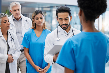 Image showing Discussion, teamwork and doctors in meeting with report for medical strategy, diagnosis and treatment. Healthcare, hospital and nursing people with patient results for planning, surgery or consulting