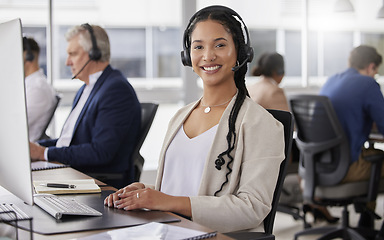 Image showing Portrait, smile and woman in call center in office working on customer support in workplace. Telemarketing, mixed race person or happiness of sales agent, female consultant or telemarketer consulting