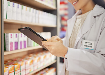 Image showing Hands, tablet and stock in a pharmacy with a woman drugstore at work, checking shelves for a product. Healthcare, medicine and trust with a female pharmacist working in a store for the sale of drugs