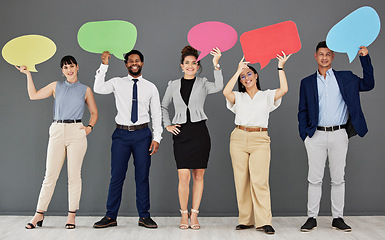 Image showing Speech bubble, collaboration and portrait with business people in studio on a gray background for communication. Social media, teamwork and diversity with a group of happy colleagues showing mockup