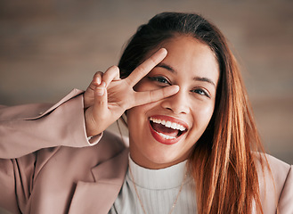 Image showing Portrait, smile and woman with peace sign, excited and happiness with joy, carefree and cheerful. Face, female and happy lady with hand gesture, facial expression and emoji with v symbol and review