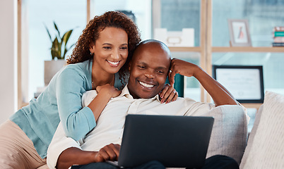 Image showing Laptop, relax and a couple watching a video on a sofa in the living room of their home together for entertainment. Computer, movie or streaming with a man and woman enjoying a series while bonding