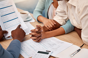 Image showing Insurance, contract and a couple with an advisor for mortgage, loan or help with taxes. Holding hands, finance and a man and woman in a meeting with a lawyer for a legal strategy, plan and advice