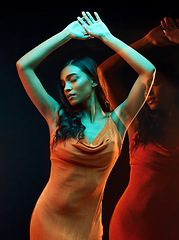 Image showing Green neon light, dance and double exposure of woman with beauty and fashion art aesthetic. Creative lighting, young female and model with dark background in studio with modern style and dancing