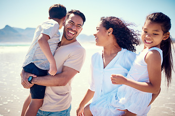 Image showing Happy family, laughing and beach hug of a mother, father and girl together by the ocean. Nature, sea and love of a mom, dad and child from the Philippines on vacation with parents on travel holiday