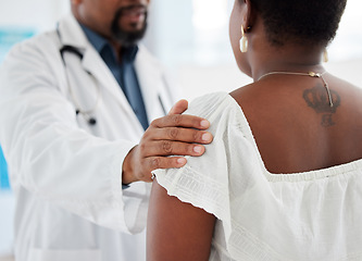 Image showing Doctor, hands and touch shoulder of patient for support, comfort and kindness. Healthcare, consultation and medical professional talking with black woman for empathy, bad news or cancer diagnosis.