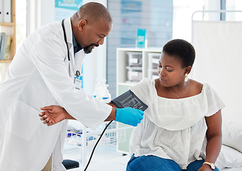 Image showing Helping, healthcare and a doctor with a black woman for hypertension, health check and service. Help, medical and a gp consulting with a patient for blood pressure exam, cardiology or monitor