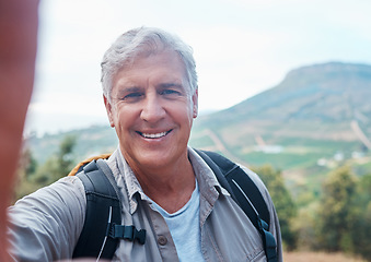 Image showing Selfie, hiking and portrait of old man on mountain for outdoor adventure, freedom and wellness in nature. Retirement, traveling and happy senior male take picture on hike, trekking and summer holiday