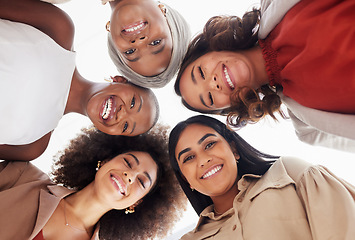 Image showing Teamwork, portrait or faces of women in huddle with goals, mission or motivation together in support. Low angle, group accountability or happy people with smile, diversity or positive growth mindset