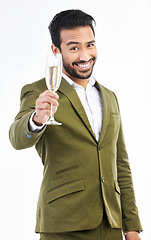 Image showing Business man, portrait and wine glass for cheers, celebration and happy hour of success on white background. Smile, entrepreneur and toast of champagne, alcohol and drinks in studio for winning offer