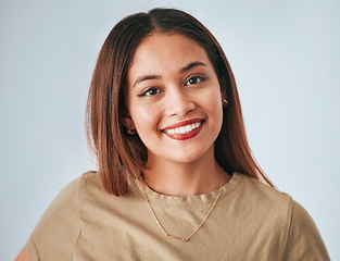 Image showing Woman with smile in portrait, face and happiness isolated on studio background with positivity and beauty. Happy, young female and smiling gen z model with confidence, makeup and lipstick cosmetics