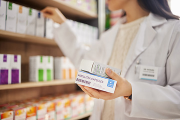 Image showing Pharmacy, tablet box in hand and woman pharmacist in drug store, pills choice and medical healthcare. Prescription drugs, health and treatment for illness, pharmaceutical and medicine professional