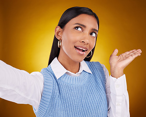 Image showing Selfie, show and mockup with woman in studio for product placement, social media and announcement. Shocked, news and space with female isolated on background for presentation, promotion and offer