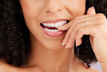 Image showing Woman, mouth and teeth closeup, flirt and bite finger with hand and manicure with beauty, dental and whitening. Makeup, natural cosmetics and flirtatious female, skincare and glow with orthodontics