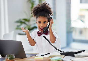 Image showing Phone call, telephone and surprise with child in office for communication, news and notification. Excited, business and comic with young girl at desk in workplace for shocked, wow and announcement