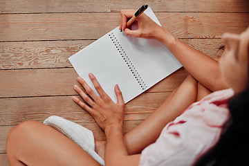 Image showing Notebook, writing and planning woman with journal for ideas, inspiration and creativity on wood floor above. Creative young person with mindfulness, healing notes and self care book for writer goals