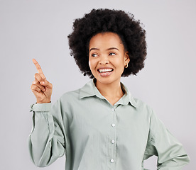 Image showing Black woman, thinking point and idea with a smile in a studio with a solution to question with happiness. Isolated, white background and female feeling happy and confident from inspiration and ideas