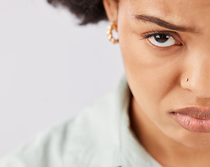 Image showing Sad, depression and portrait of black woman in studio with upset, unhappy and depressed facial expression. Mental health, mockup and face of girl on white background with emotions, sadness and frown