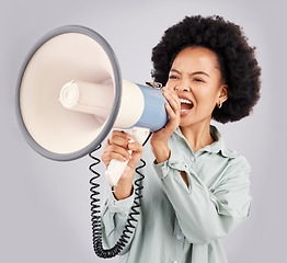 Image showing Megaphone, protest and black woman shouting in studio isolated on white background with voice. Screaming, angry and person with loudspeaker for human rights, change or justice, announcement or speech