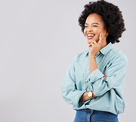 Image showing Thinking, smile and mockup with a woman on a gray background in studio for product placement. Idea, happy and space with an attractive young afro female contemplating a though on blank mock up