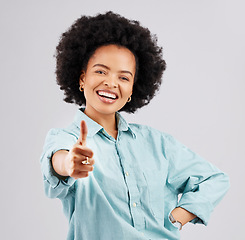 Image showing Portrait, thumbs up and black woman laughing in studio isolated on a white background. Success, happiness and person with hand gesture or emoji for winning, approval or agreement, like or thank you.