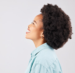 Image showing Black woman, profile and happiness smile in a studio thinking and feeling relax. Isolated, white background and happy young model with youth and natural afro with female empowerment and idea