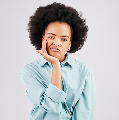 Image showing Confused, unhappy and portrait of black woman in studio with upset, bored and annoyed facial expression. Depression, mockup and girl on white background with boredom gesture, sadness and thinking