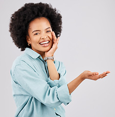 Image showing Product placement, hand and portrait of black woman in studio for branding, advertising and choice gesture. Promotion, mockup space and happy girl show hands for marketing, presentation and logo