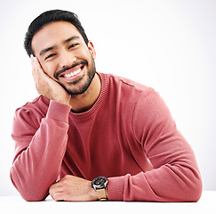 Image showing Happy, man and portrait in a studio with a smile looking attractive and handsome. Isolated, white background and resting male model feeling calm, friendly and confident with modern style and mockup