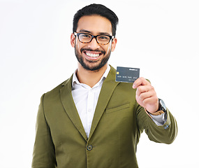 Image showing Smile, credit card and portrait of man in studio with happy financial freedom and security savings. Happiness, Indian businessman with banking and saving by investing in small business startup budget