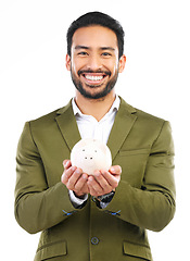 Image showing Smile, piggy bank and portrait of man in studio, happy financial freedom and savings on white background. Happiness, businessman with money box and saving, investing in small business startup plan.