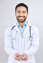 Image showing Pharmacist portrait, studio drugs or happy man with pharmaceuticals, pills or medicine supplement. Healthcare support, medical pharmacy or male doctor with prescription medication on white background