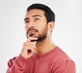 Image showing Serious man, thinking face and ideas in studio, white background and vision of mindset, planning and question. Focused male model daydream of decision, remember memory and brainstorming solution