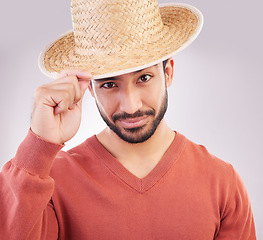 Image showing Happy, stylish and portrait of an Asian man with a hat isolated on a white background in a studio. Fashionable, confident and a Japanese guy showing classic headwear with confidence on a backdrop