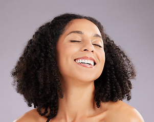 Image showing Woman, skincare and smile from natural beauty, wellness and facial in a studio. Cosmetics, isolated and grey background with a young female model with dermatology, makeup and self care with happiness