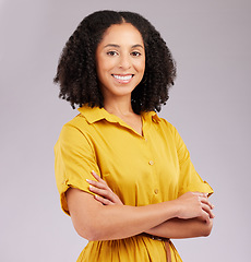 Image showing Business woman with smile in portrait, arms crossed and career success with positive mindset on studio background. Happy corporate female, professional and empowerment with pride and confidence