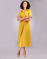 Image showing Business woman, confident and portrait smile standing with arms crossed against a gray studio background. Isolated and stylish African American female model with afro smiling in confidence on mockup