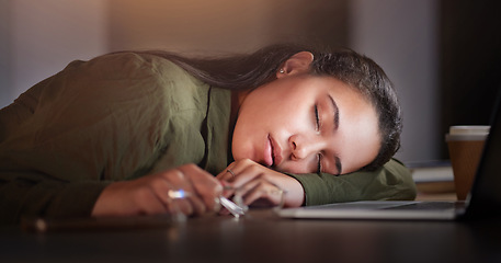 Image showing Tired, business woman and sleeping in office at night with burnout, stress problem and low energy in evening. Fatigue, lazy and overtime female employee nap at table, deadlines and rest of overworked