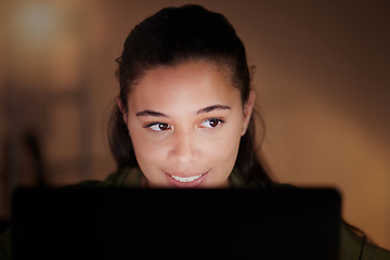 Image showing Woman, happy business and laptop at night for planning online strategy, research and company in dark office. Young female worker working overtime on computer for deadlines, productivity or technology