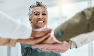 Image showing Teamwork, happy and hands stack of business people together for motivation, support and community. Collaboration, team building and woman with staff for diversity, trust and solidarity goal in office